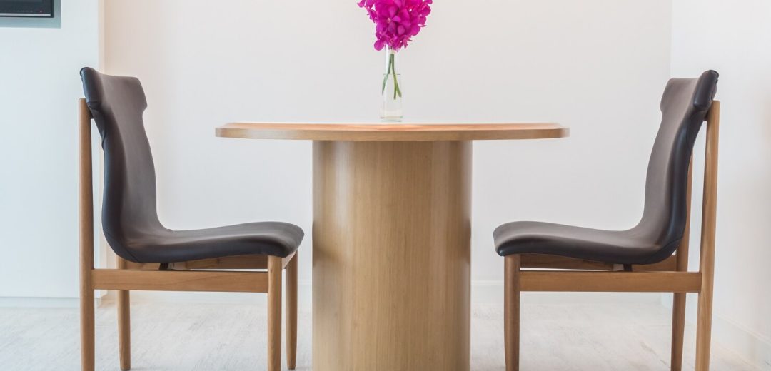 black-chairs-with-wooden-table_1203-494